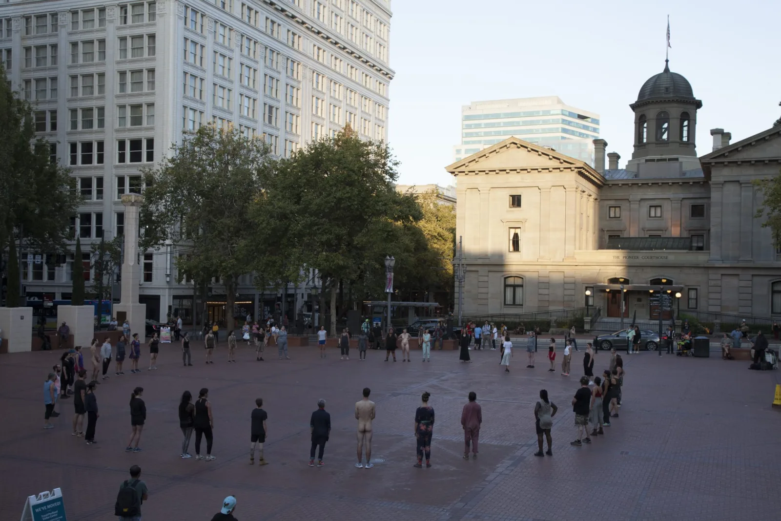 A large group moving together in Mia Habib's ALL - a physical poem of protest.